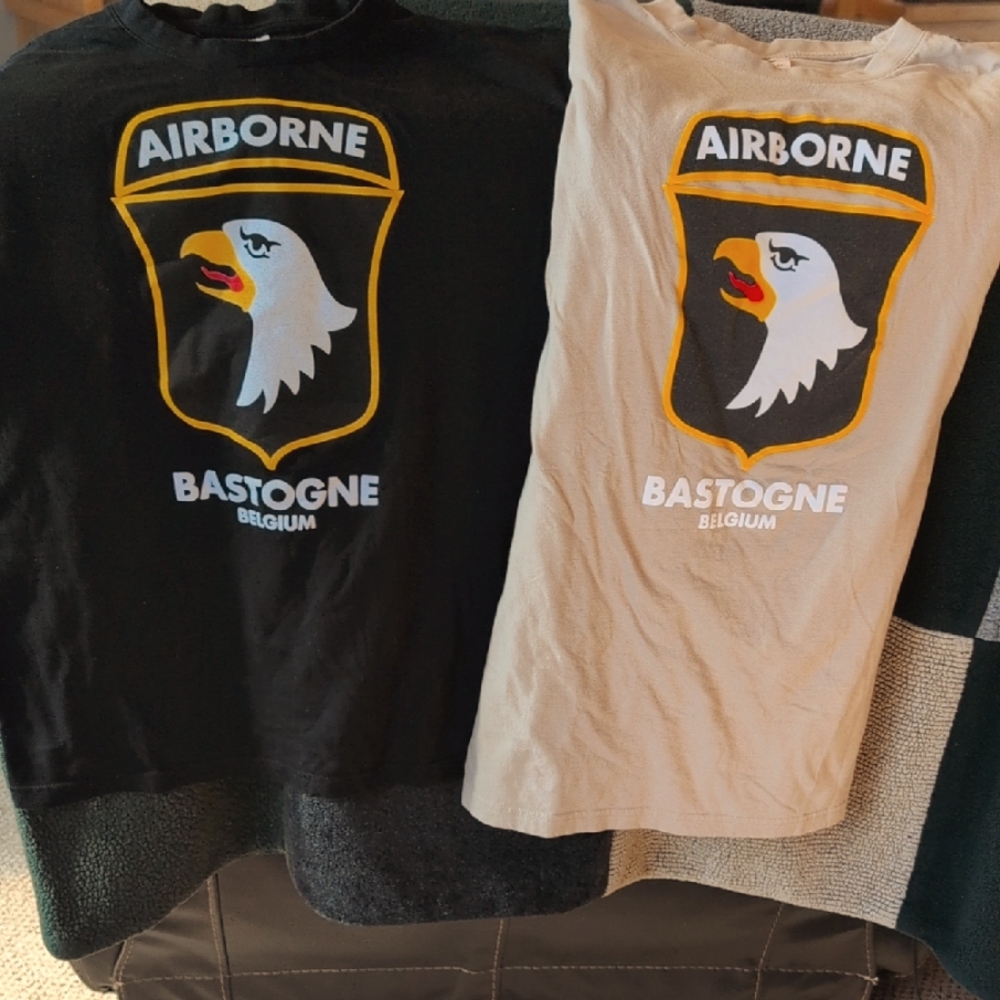 2 Airborne Bastogne Belgium T- Shirts Tan Sz L & Black Sz S. Eagle Graphic front